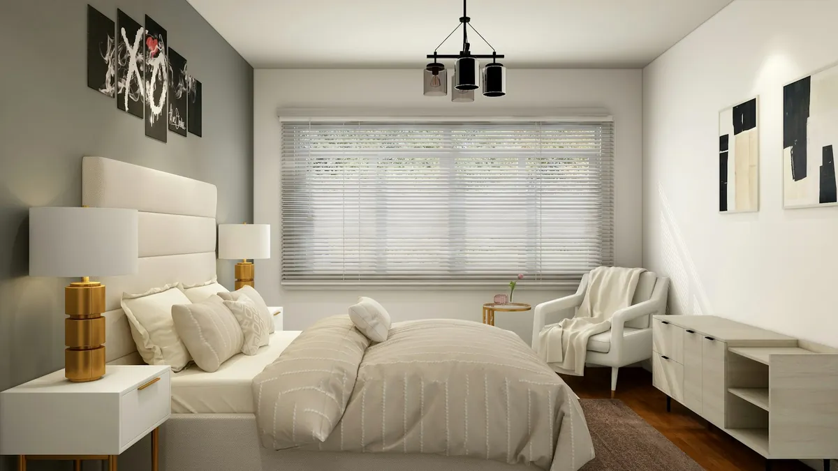 Bedroom with a white upholstered bed and a wide window with a shade lowered
